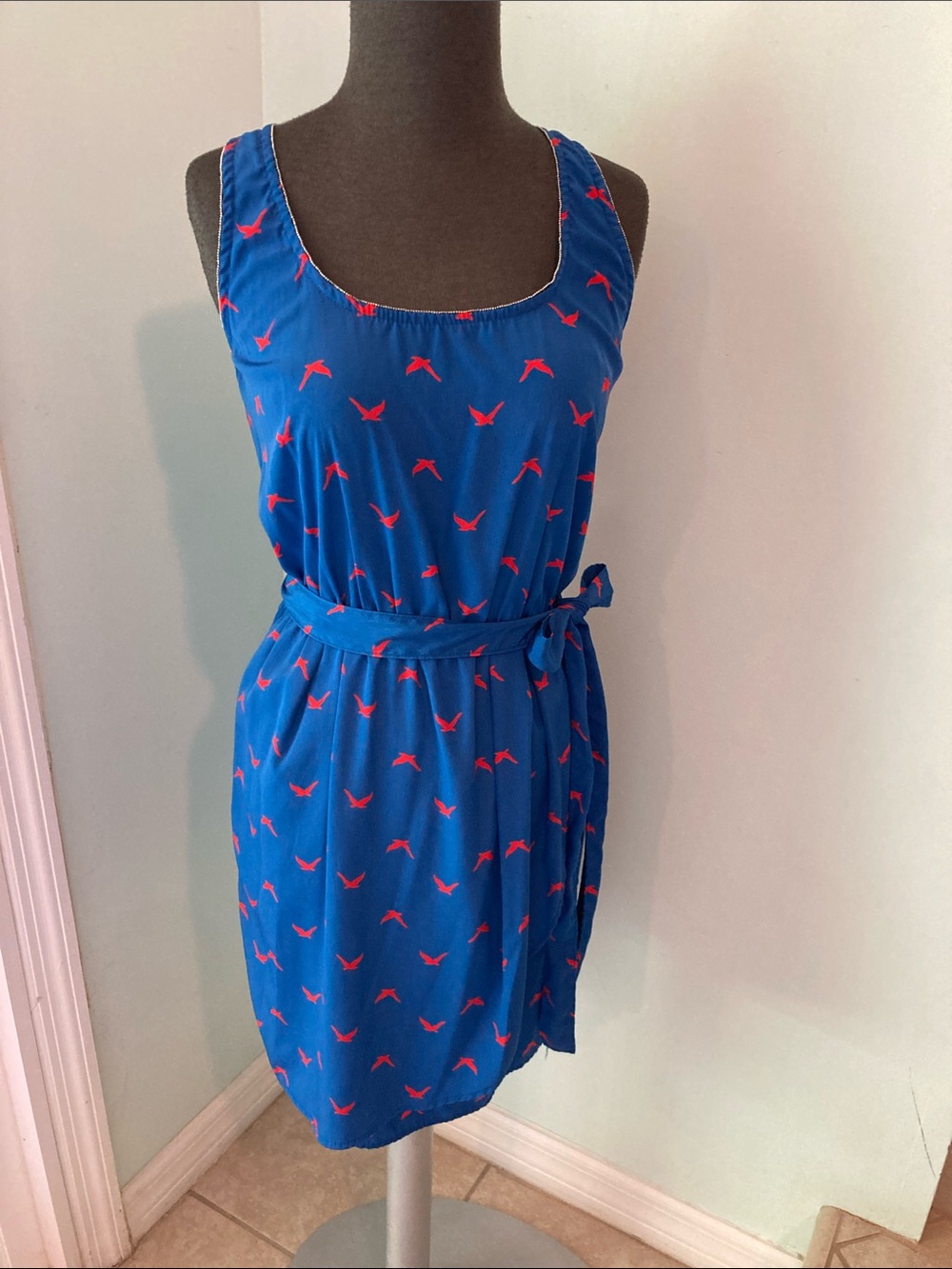 Karlie dress size medium. Sleeveless dress, elastic waste. Red and blue.